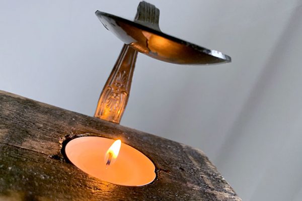 Woodern handmade oil burner with silver spoon and flame