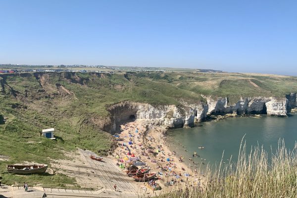 Flamborough head cliffs beach looking out onto the seafront in the UK